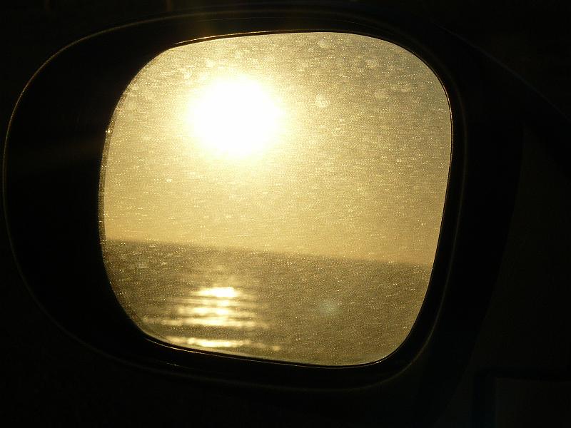 P1070406.JPG - A sunset from my sideview mirror. I wish it was clean, I think that would have made it kind of cool.