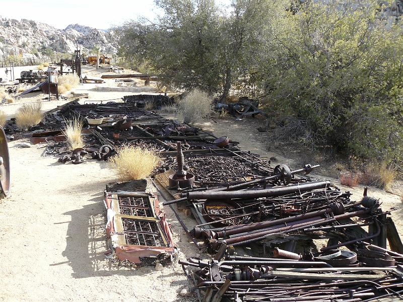 P1080217.JPG - His car parts section of the junk yard.