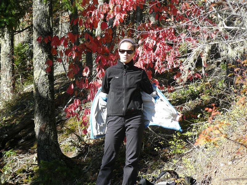 P1060004.JPG - On this hike we finally had some sun so Rebecca decided to try and make some money at the trailhead.